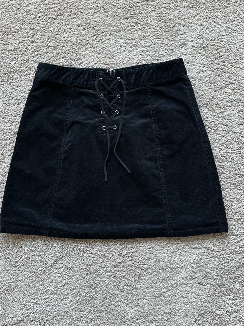 Black corduroy mini skirt with lace-up front